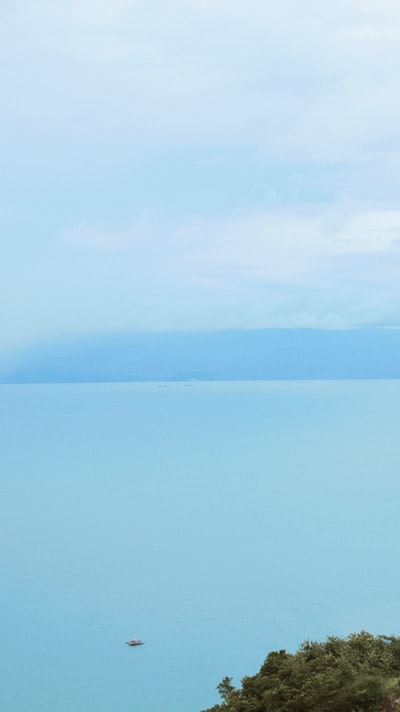 Blue sea under the blue sky during the day
